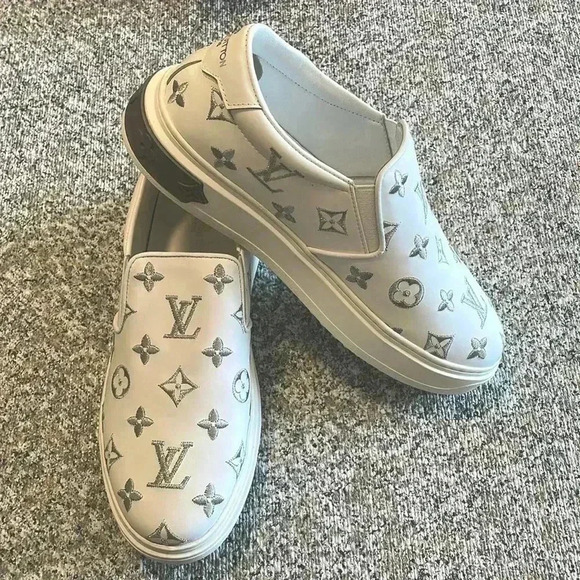 Louis Vuitton Shoes - Louis Vuitton slip on sneakers ladies size 39 white and silver rare